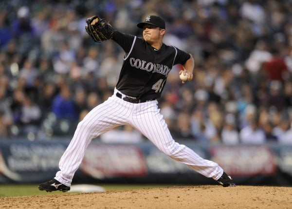 Rex Brothers delivers a pitch for the Colorado Rockies in 2013.