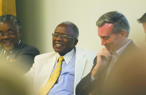 Race and the church : Fred Gray, center, flashes a smile during a panel discussion on racial relations in Churches of Christ. At left is Andrew Hairston, longtime minister for the Simpson Street Church of Christ in Atlanta. At right is Doug Foster, church history professor at Abilene Christian University. | PHOTO BY KRISTI JONES