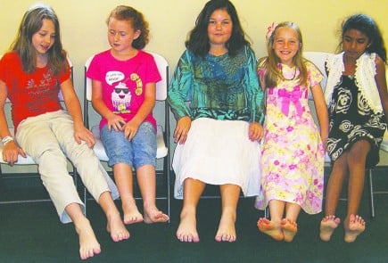 Girls at the church show off their bare feet. – PHOTO PROVIDED BY RICK FYFFE