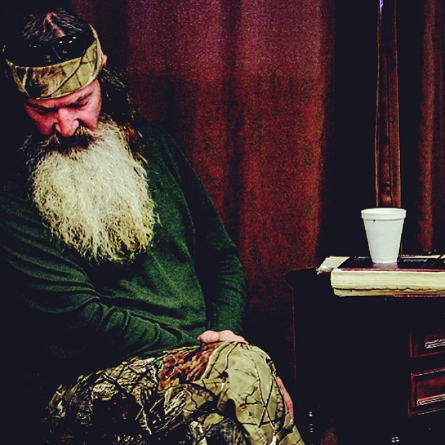 Phil Robertson prays at the end of a Sunday school class that he teaches at the White's Ferry Road Church of Christ in West Monroe