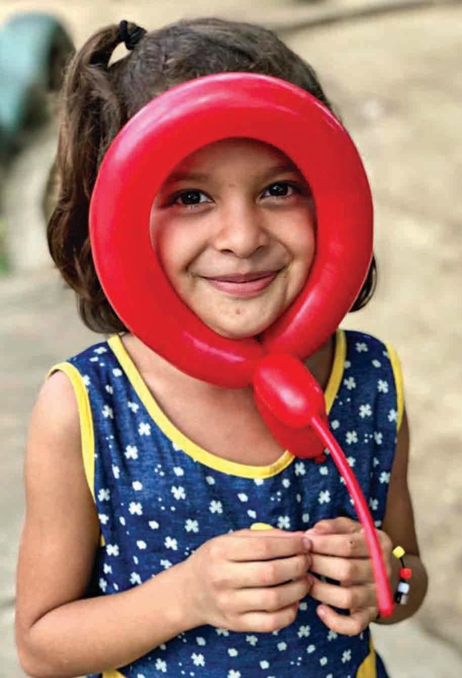 A young girl smiles during a Vacation Bible School in Nicaragua.