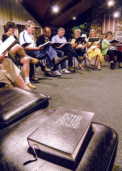 Attendees gather in the lobby of the Blue Ridge Center to sing following the evening assembly and "Afterglow