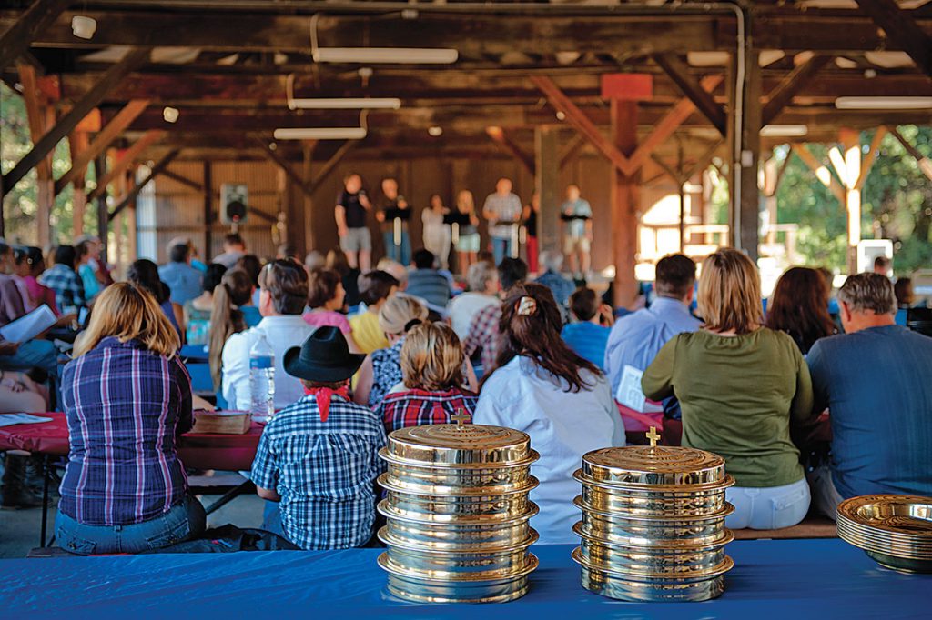 As the congregation and praise team lift voices in worship