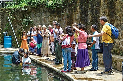 Myrna Sandoval prepares for baptism in the Central American town of Ataco