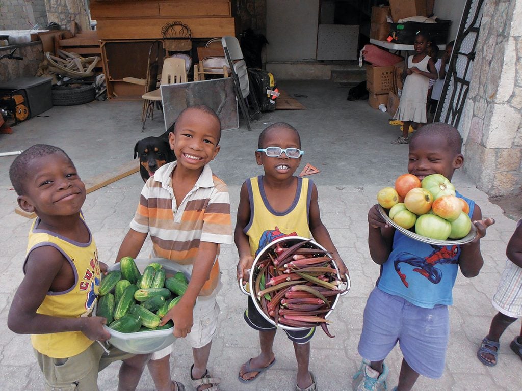 GROWING CROPS FOR GROWING CHILDREN IN HAITI. In Port-au-Prince