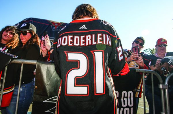 Lera Doederlein wears her customized Anaheim Ducks jersey before the team’s Opening Night game against the Arizona Coyotes at the Honda Center in Anaheim, Calif.