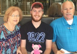 Hunter Wiederstein, center, with his grandparents, Allen and Jeanette Wiederstein.