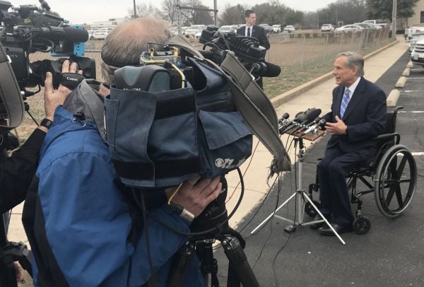 After the funeral for Richard White, Texas Gov. Greg Abbott talks to reporters outside the Western Hills Church of Christ in Fort Worth.