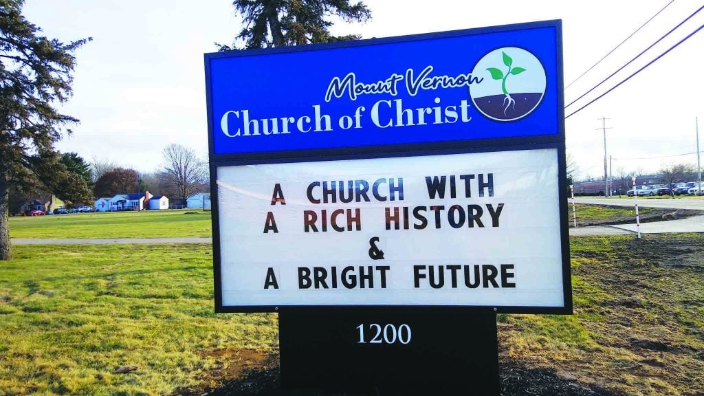 The new church sign touts the merger of two congregations that previously split.