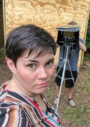 Celeste Smith playfully reacts as her minister husband, Steven, makes yet another video for their congregation in their hot, humid backyard in East Texas.