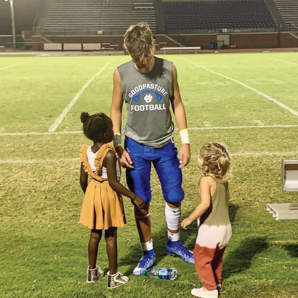 Willa Gray and Ada James cheer for their uncle Tyler, Thomas Rhett’s stepbrother, at his Goodpasture Christian School football game in 2019.