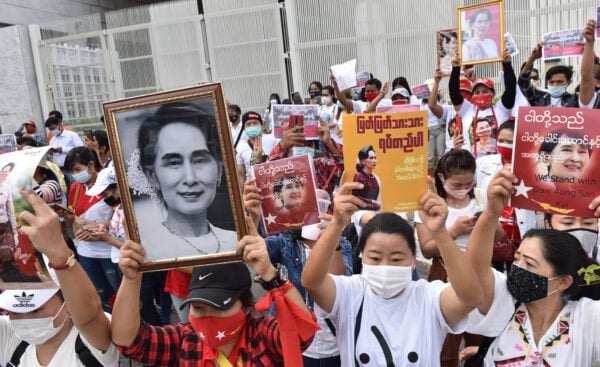 Myanmar protesters in Thailand rally in front of the United Nations facility in Bangkok.