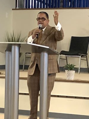 Russell A. Pointer Sr. speaks to the Kennedy Heights church.
