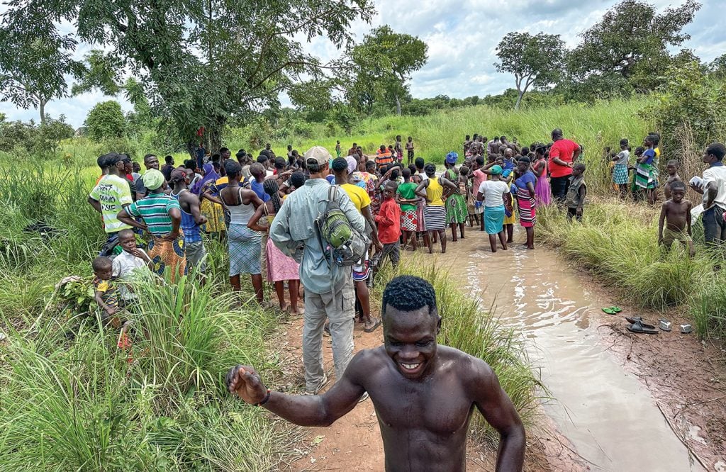 A smile crosses a teen’s face just after his baptism in the village of Ghanani, Ghana.