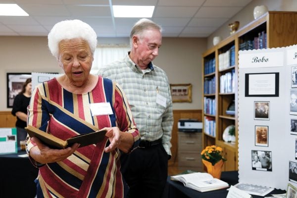 Carolyn Ragland Poston and her husband, Terry, admire the church’s history exhibit.