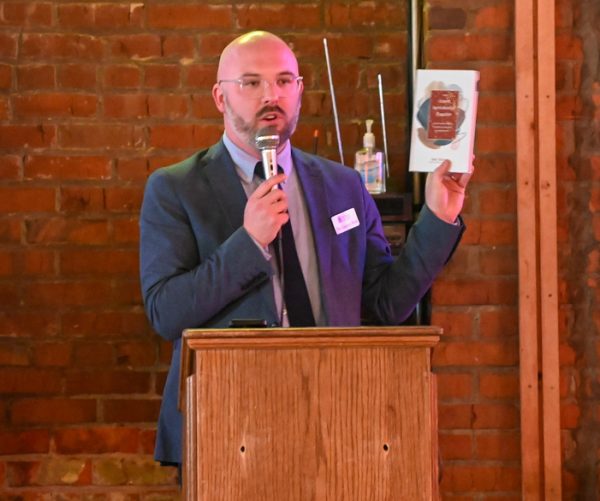 Garrett Best, chair of York University's Department of Bible and Ministry, speaks during an Equip Conference dinner at a York, Neb., restaurant.