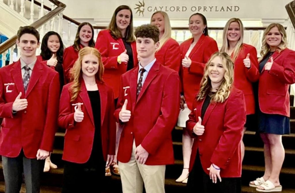 Present and past Red Coat Award winners pose for a photo at the Lads to Leaders convention in Nashville, Tenn.