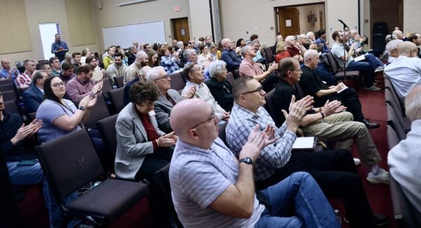 Attendees applaud a speaker at a recent reunion at Harding School of Theology in Memphis, Tenn.
