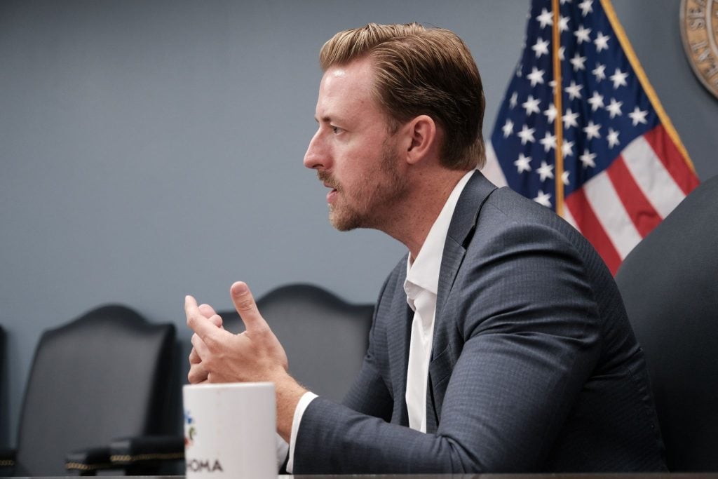 Ryan Walters, Oklahoma's superintendent of public instruction, answers a question during an interview with The Christian Chronicle.