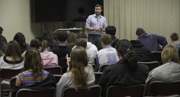 Travis Creasy, minister for the Riverside Church of Christ in Fayetteville, Tenn., speaks to youths during a Bible class at the Dallas CYC.