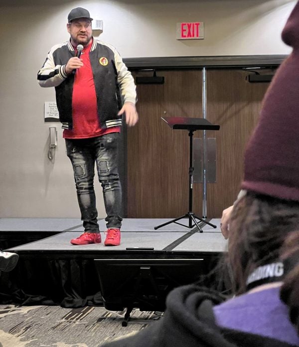 Hoss Ridgeway, a preacher and Christian comedian from Franklin, Ind., entertains the crowd at Winterfest Way Out West in Franklin, Ind.