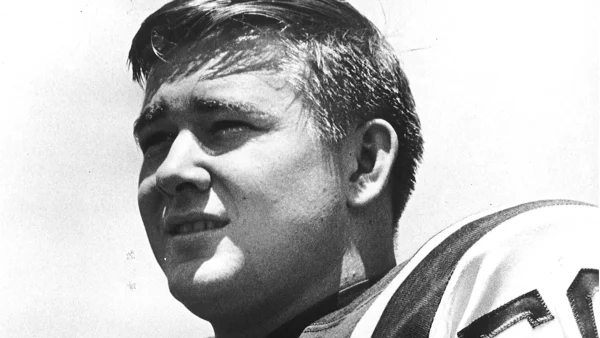 Carl McAdams is shown in his time as a New York Jets football player in the 1960s.