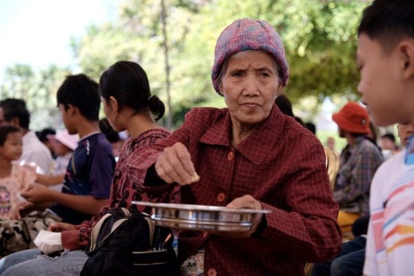 Christians share the Lord's Supper during Sunday worship in Preah Netr Preah, Cambodia.