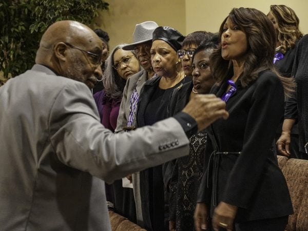 The Andrew Hairston Memorial Chorus sings hymns including "Waymaker" during the Homegoing Service at the Simpson Street Church of Christ.