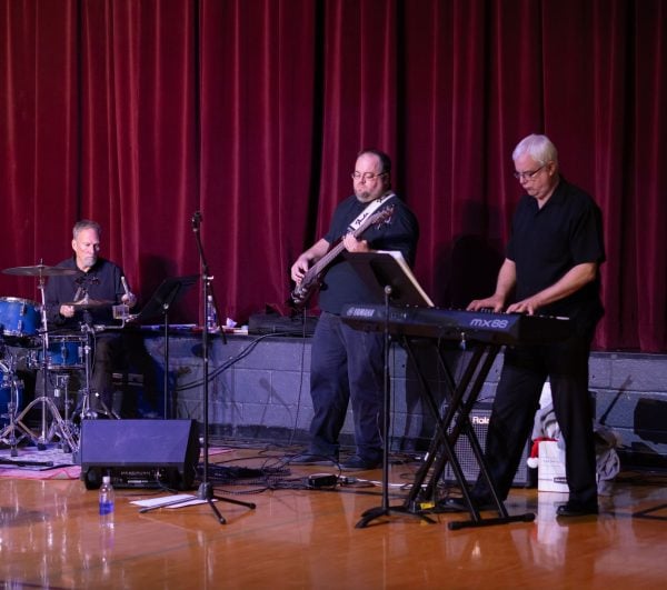 From left, Gary Miller, Josh James and Mark Crawford play with the Hardeman Boys.