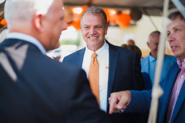 Mark Moore speaks with guests in Fitzgerald, Ga., during a 2024 visit from USAID administrator Samantha Power, who was placed on leave in early 2025.