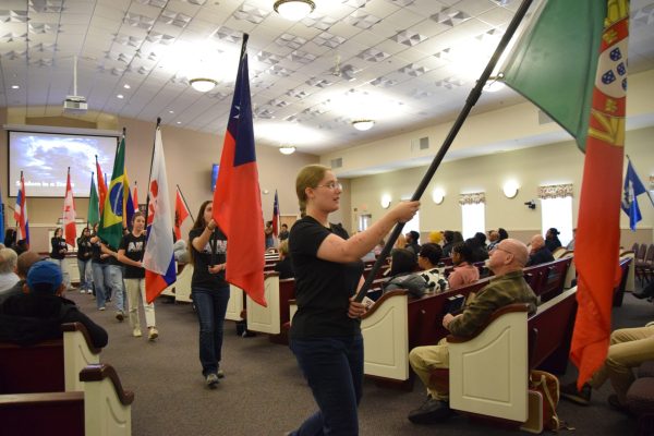 AIM students put on a flag presentation at the Inspire New England conference.