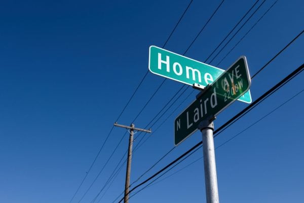 The signs at the corner of Home Street and North Laird Avenue where the Hastings congregation meets. 