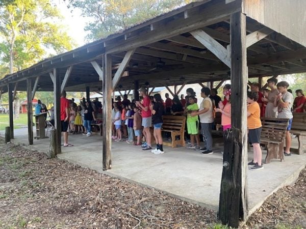 Lights out at Texas summer camps 9 MyCelestialApp Campers gather in the tabernacle at the Peach Valley Christian Youth Camp.
