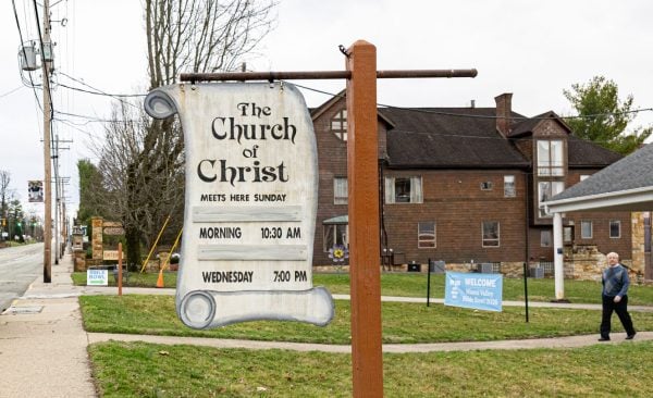 A sign denotes the meeting place of the National Road Church of Christ in Wheeling, W.Va.