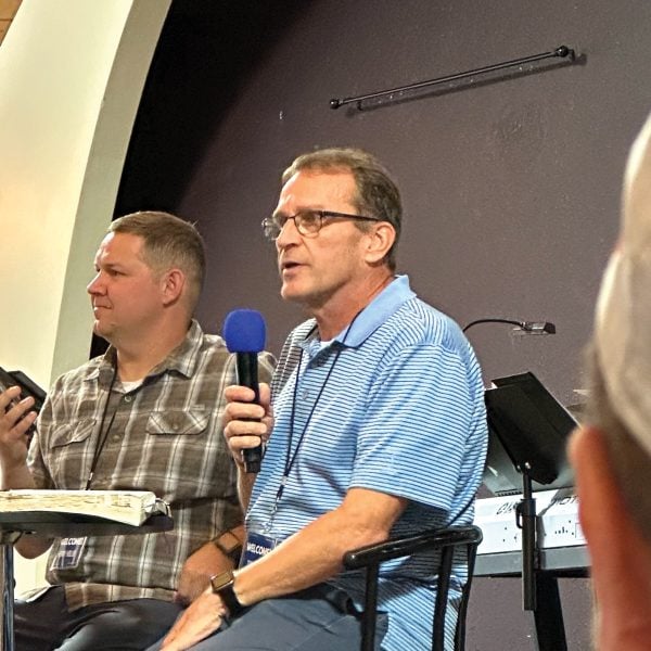 A ‘divine name’? 6 MyCelestialApp Troy Burns, right, and Henry Holub preach at the CityLight Church’s first service.