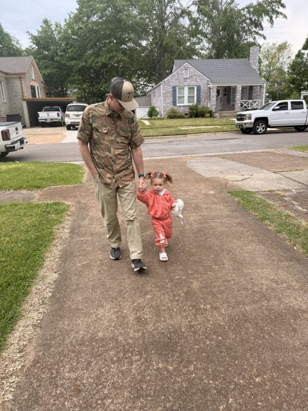 ‘Cancer can be a ministry’ 2 MyCelestialApp Chris McCurley walks down the driveway holding the hand of his granddaughter, Ash Jobe.