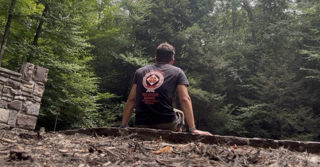 Ephraim Rodenbach looks out into Summit Bechtel Reserve.