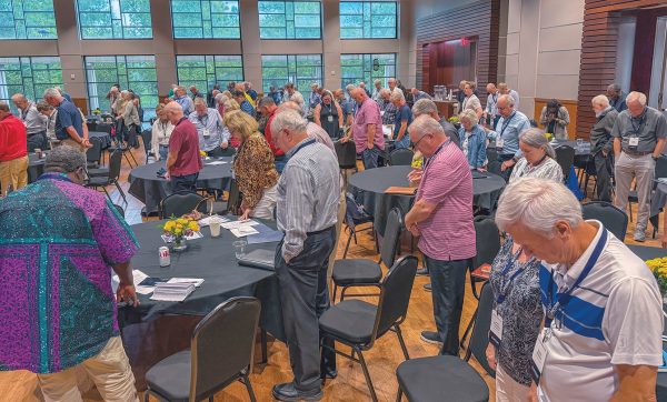 Participants in the Lipscomb Faith and Leadership Forum pray at the two-day event's conclusion.
