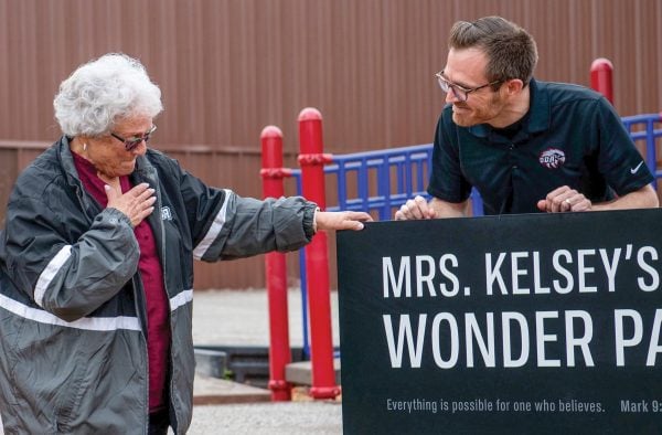 Mary Ann Kelsey reacts after she learns that Oklahoma Christian Academy’s new playground bears her name.